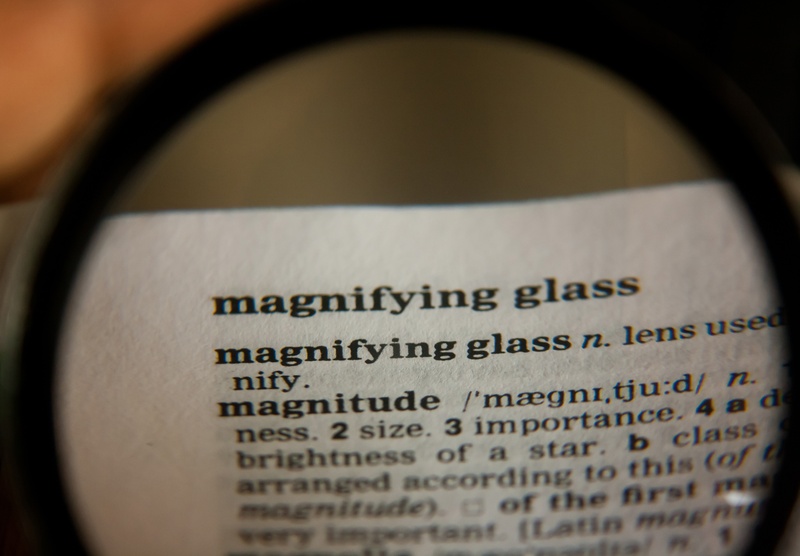 loupe, lens, extreme close-up, paper, close-up, studying, dictionary, study, selective focus, arts culture and entertainment, page, search, focus, searching