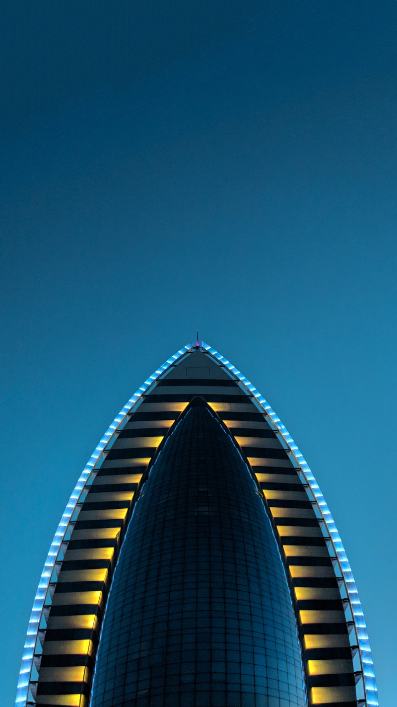 building, low angle view, building exterior, looking up, blue, light, illuminated, night, high rise, unnamed road, modern design, built structure, nature