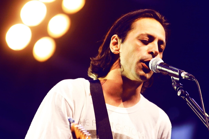 input device, holding, headshot, musician, music, performance, lifestyles, drinking, microphone, one person, rock stars, musical instrument, young men