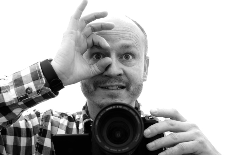 camera - photographic equipment, characters, in focus, dslr, black, one person, mature men, portrait, selfie, photography themes, ok, grayscale, looking at camera