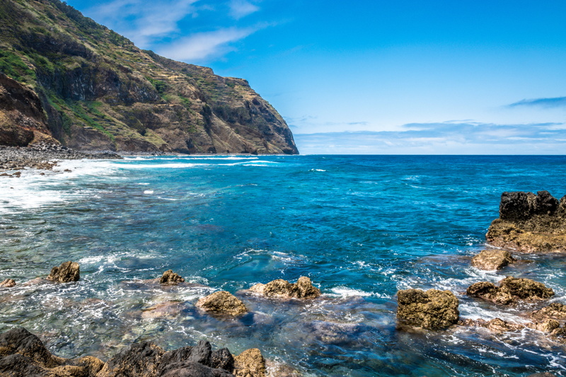 water, rocky coastline, idyllic, sky, solid, island wood, outdoors, mountain, beauty in nature, land, summer, no people, day, scenics - nature, beach, horizon over water