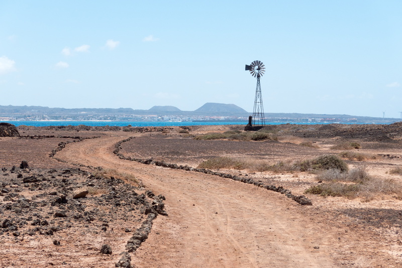 land, los lobos, beauty in nature, day, transportation, landscape, tranquil scene, pinwheel, los lobos island, tranquility, sand, remote, non-urban scene