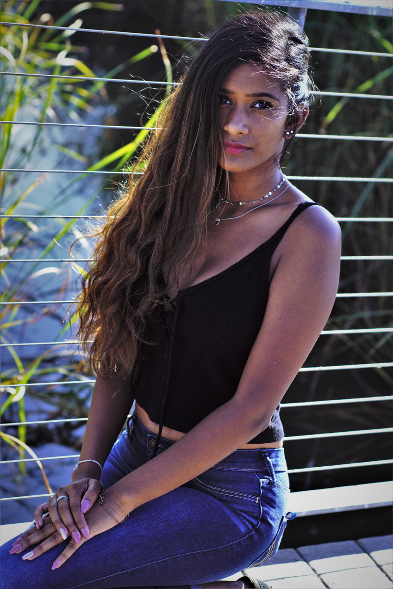 green, bridge, shrubbery, beauty, three quarter length, long hair, looking at camera, indian, sparkling, trees, young adult, women, girl, 5K, casual clothing