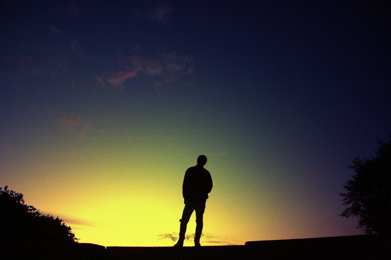 720P, tranquil scene, outdoors, beauty in nature, lifestyles, sky, cannon, real people, sunset, one person, full length, orange color, scenics - nature