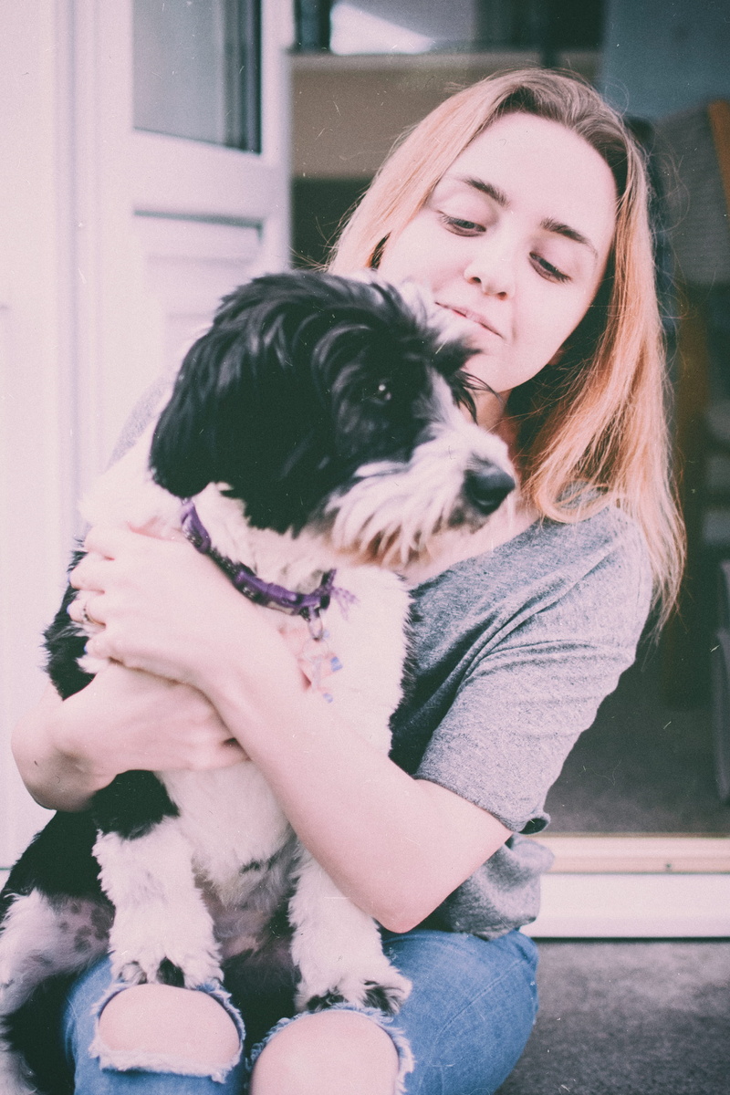 face, canidae, animal, fur, one animal, emotion, dog, mammal, adorable, holding, care, domestic animals, love, lady, facial expression, woman, canine, vertebrate