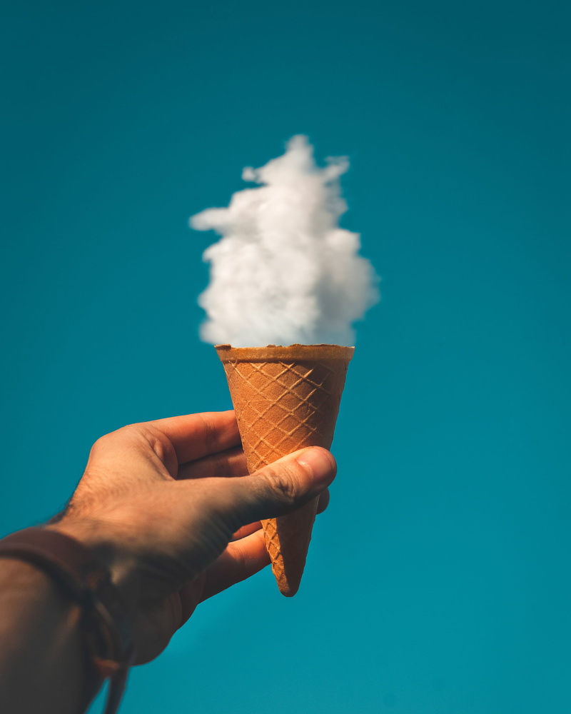 unrecognizable person, blue, personal perspective, cream, real people, food, human body part, hand, body part, temptation, ice, human finger, human limb
