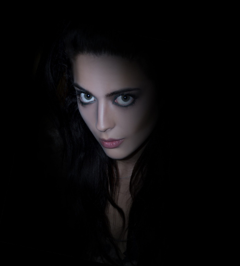 studio shot, 1080P, model, contemplation, indoors, dark, fierce, face, human body part, long hair, one person, eyeshadow, hairstyle, fashion, young, womens