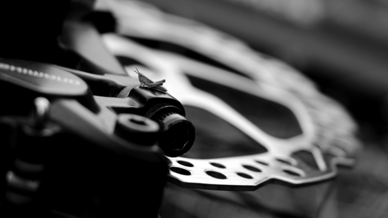 opportunity, warning sign, grasshopper brakes shimano, sign, close-up, indoors, leisure activity, pattern, focus on foreground, 1080P, no people, selective focus