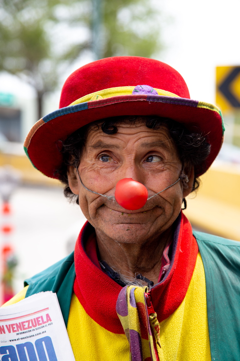 human, day, tijuana, men, performer, adult, one person, apparel, person, scarf, hairstyle, mature adult, clown, headshot, 5K, glasses, festival, eyes