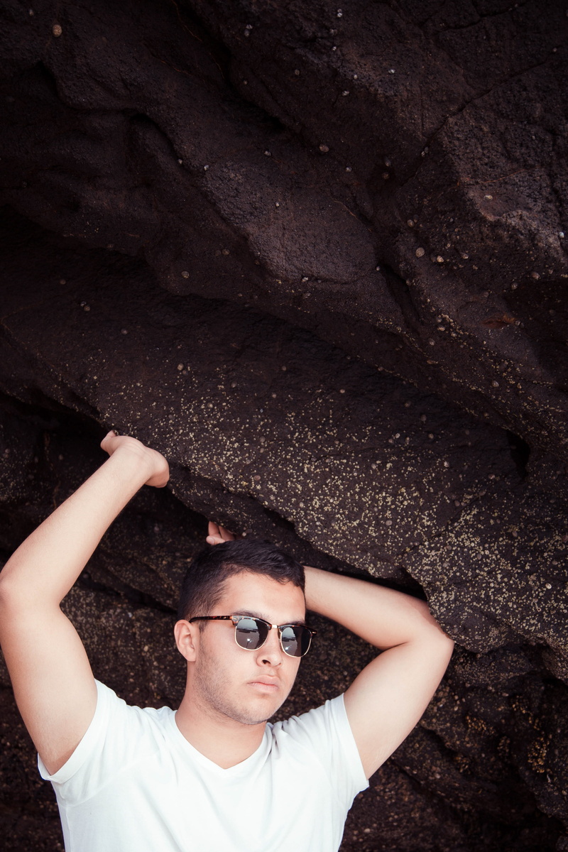 looking at camera, beautiful woman, nature, tijuana, fashion, day, glasses, leisure activity, casual clothing, beach, real people, rock - object, sunglasses
