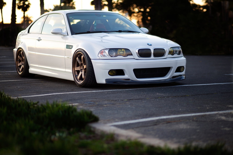 motor Vehicle, wheels, day, new, modern, grass, parking, sedan, white, front View, no People, sport, elegance, mode of transportation, expense, technology