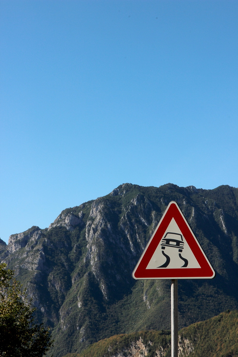 warning Symbol, blue, clear sky, guidance, road, sign, information, communication, representation, warning, outdoors, danger point, mountain, Road Sign