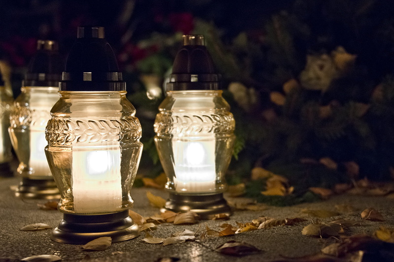 memory, the dead, selective focus, table, indoors, illuminated, tombstone, glass - material, fire - natural phenomenon, all souls  day, transparent, night