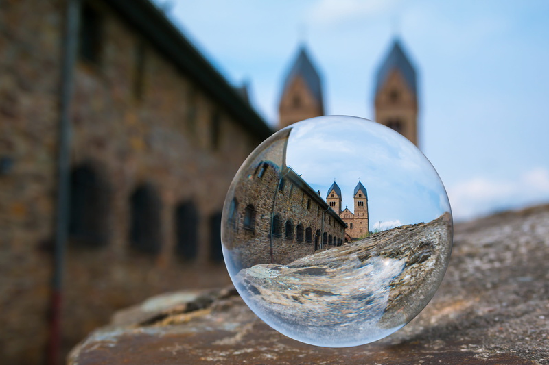 focus on foreground, monastery, st hildegard, building exterior, water, nature, glass ball, globe image, crystal, brown, day, glass, outdoors, about, building