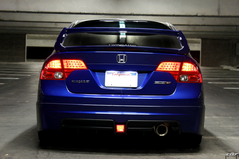 motor vehicle, night, mugen, stationary, honda, number, built structure, rear, parking garage, blue, illuminated, architecture, civic, city, garage, car