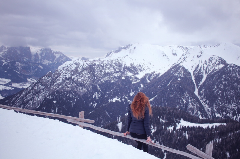 looking at view, adult, trees, one person, summit, nature, plants, front, daytime, cloud - sky, sitting, travel, cloud, winter, alone, fence, outdoors