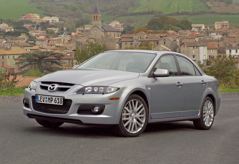 transportation, travel, building, built structure, architecture, day, land vehicle, city, car, mps, motor vehicle, (2006), 720P, mazda, outdoors, building exterior