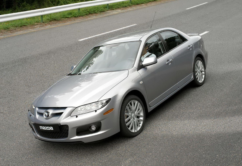 wealth, mode of transportation, motor vehicle, stationary, retro styled, road trip, mps, wheel, metal, road, city, street, mazda, silver colored, luxury