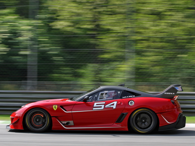 car, outdoors, blurred motion, land vehicle, motor racing track, motor vehicle, red, plant, day, speed, professional sport, transportation, sports car
