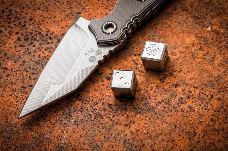 knife dice, orange color, table, paper, healthy lifestyle, no people, close-up, indoors, finance, personal accessory, still life, text, studio shot, wood - material