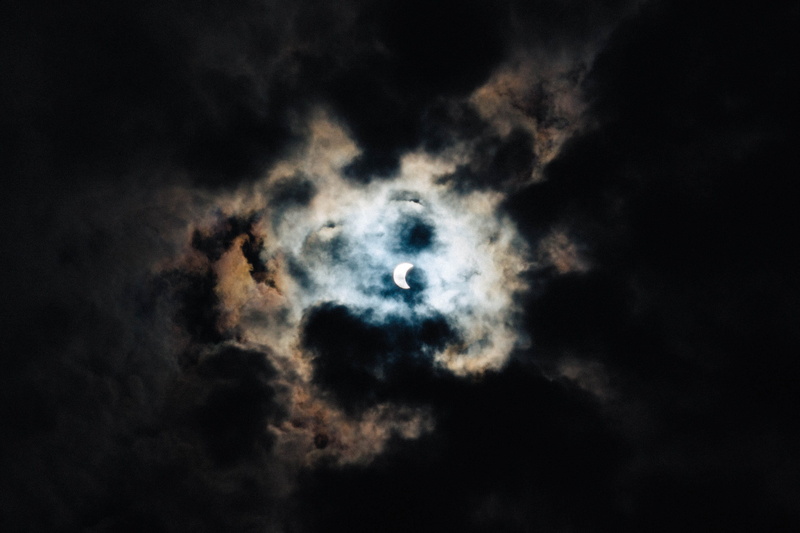 smoke - physical structure, clouds, blue, outdoors, eclipse, day, no people, 2K, dark, crescent moon, behind, full moon, white, crescent, moon, untitled