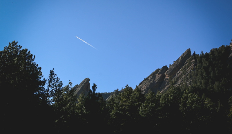 daylight, beauty in nature, coniferous tree, skies, hiking, airplane, boulder, mountain, tranquil scene, transportation, trees, clear sky, landscape, rocks