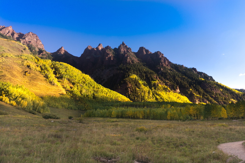 beauty in nature, outdoors, yellow, no people, non-urban scene, environment, sunrise, mountain range, mountain, sky, plant, land, tranquility, aspen, sleeping sexton