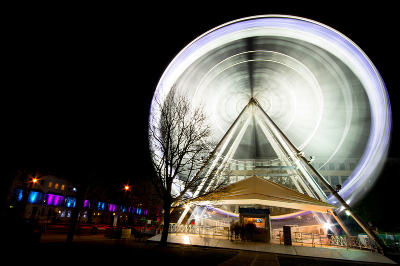illuminated, asphalt, built structure, ferries, 5K, incidental people, architecture, tarmac, long exposure, urban, sky, ferris wheel, time, wheel, tree