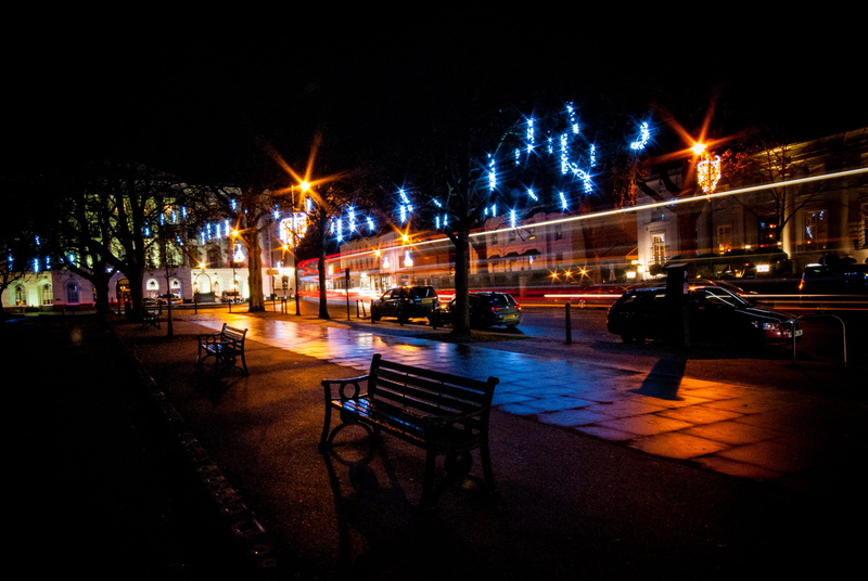 illuminated, transportation, bench, tree, outdoors, light, canal, sky, no people, 2K, city, nature, water, street, lighting equipment, seat, cheltenham
