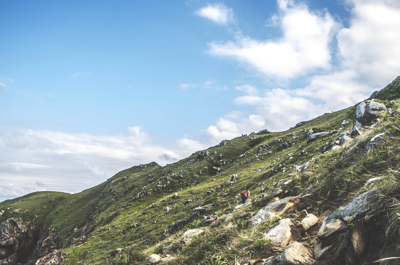 hiker, remote, grass, climbing, rock, cloudy, outdoor, outdoors, person, idyllic, tranquil scene, environment, hike, landscape, no people, day, mountain peak