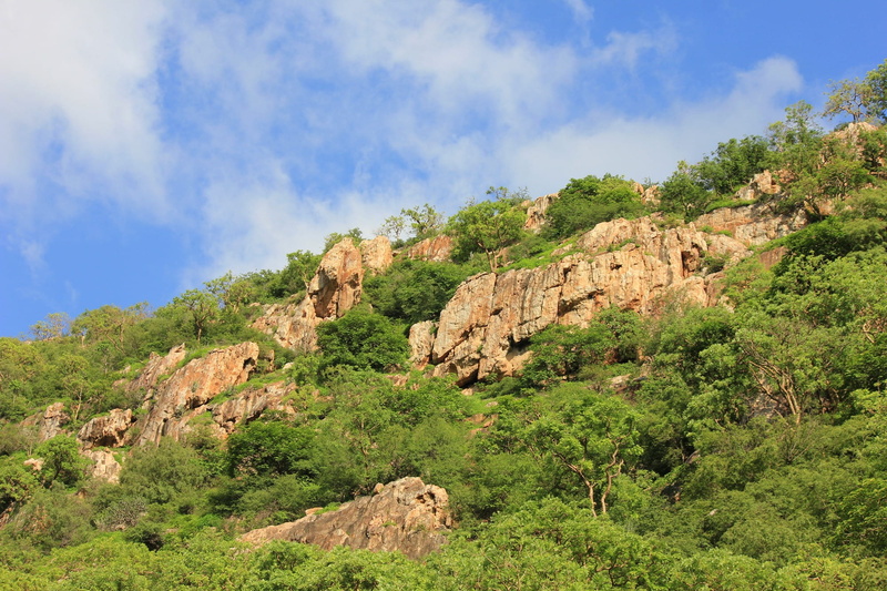 cloud - sky, hillside, rocky, outdoors, nature, peaks, day, rock - object, vegetation, scenics - nature, white, scenic, rock, stones, green color, trees