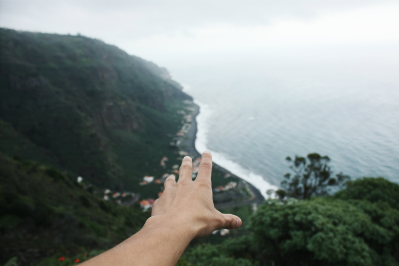 hillside, scenics - nature, madeira, hand, finger, human body part, left, coastline, real people, nature, sky, coast, touch, day, aerial, mountain, ocean