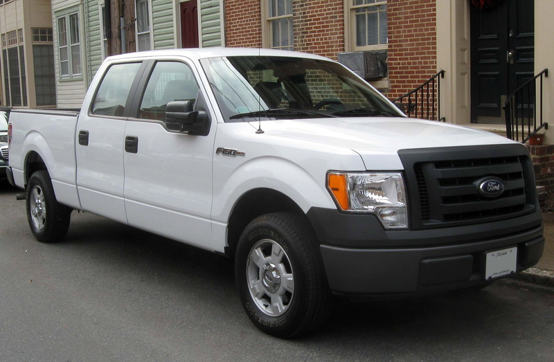 stationary, architecture, wheel, focus on foreground, selling, series, street, black color, building exterior, Ford F-Series, outdoors, best selling truck