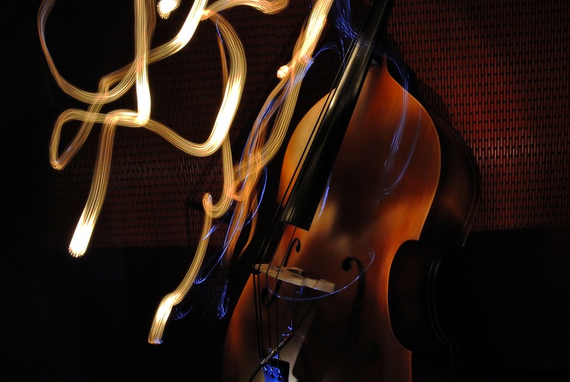 light painting, bow - musical equipment, studio shot, black background, guitar, performance, music, still life, arts culture and entertainment, dark, upright bass