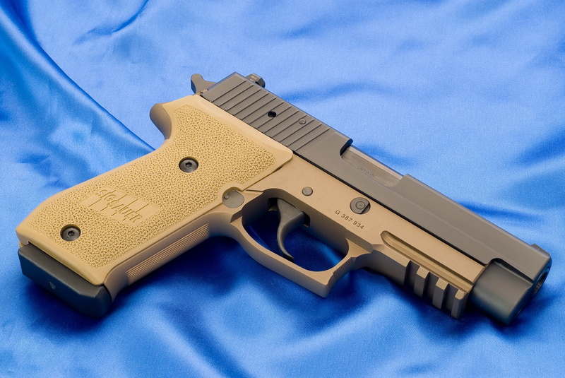 pistol, weapon, crime, indoors, man made, protection, aggression, studio shot, social issues, close-up, brown, gun, law, cloud - sky, communication, still life