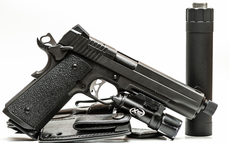 studio shot, still life, warning sign, aggression, cut out, crime, white background, handgun, sign, security, social issues, gun, indoors, violence, publication