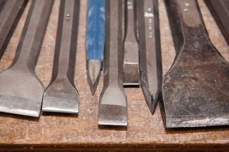 steinmetz career, iron - metal, profession, close-up, alloy, work tool, hand tool, rods, stone work, air hammer, eating utensil, household equipment, workshop