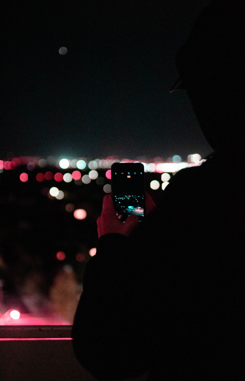 using phone, phone, smart phone, electronics, real people, photography themes, illuminated, hand-held computer, photographing, technology, outdoors, holding