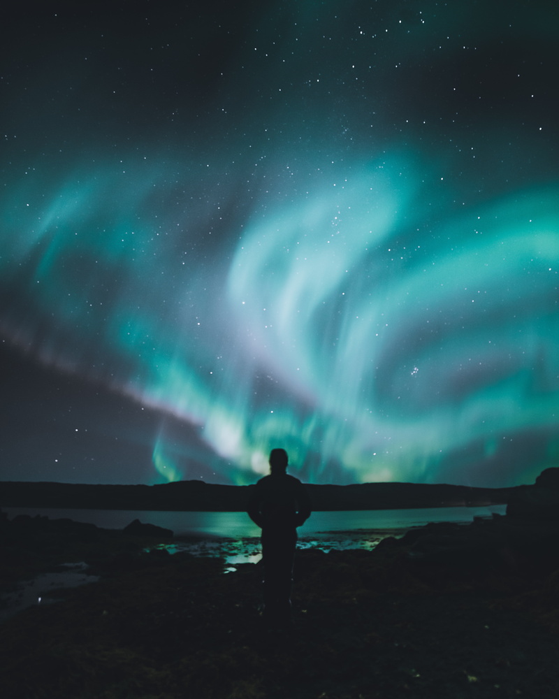 green color, sea, real people, scenics - nature, night, dark, astronomy, space and astronomy, mountain, men, dusk, tranquil Scene, nature, space, star - Space