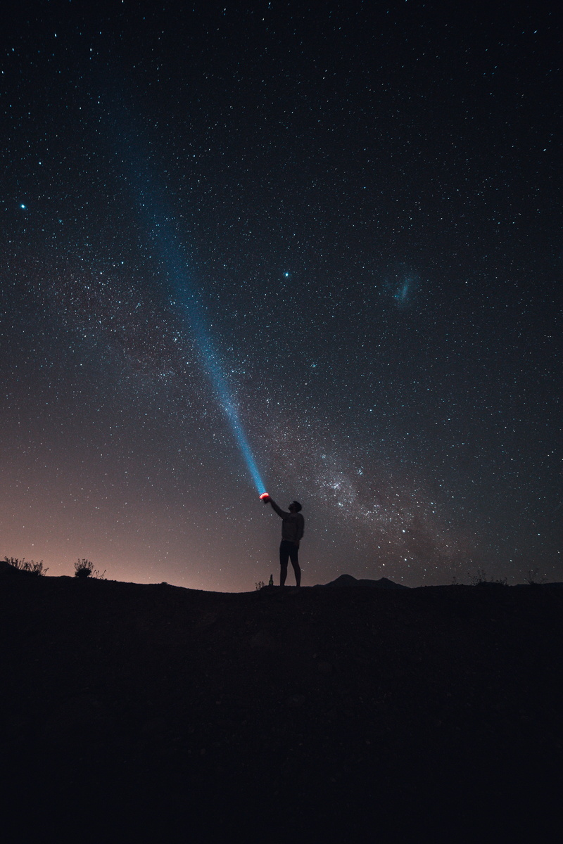 adult, star, star field, flashlight, space and astronomy, scenics - nature, starry sky, standing, night, solitude, one person, galaxy, astronomy, sky, space