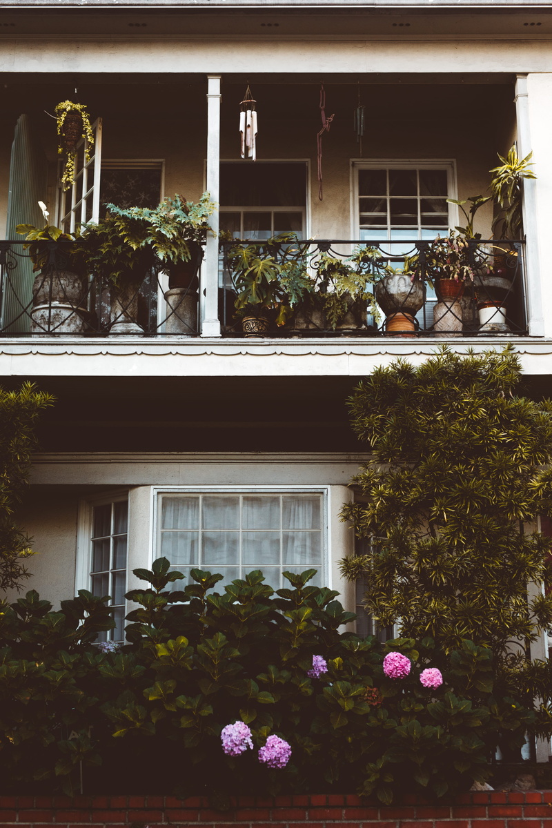 golden light, residential District, residential Building, facade, beige, balcony, urban Scene, summer, built Structure, outdoors, nature, concrete, bohemian