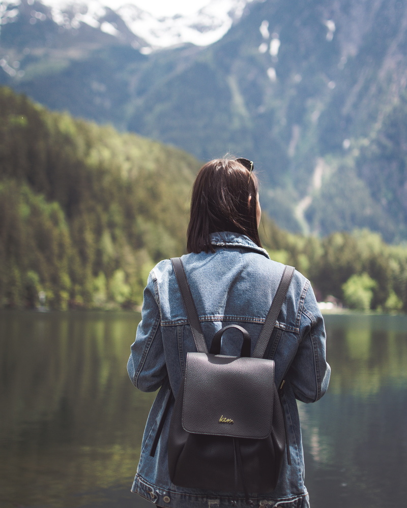 wearing, real people, outdoors, warm clothing, style, focus, near, 4K, backpack, daytime, scenics - nature, lifestyles, focus on foreground, nature, coat