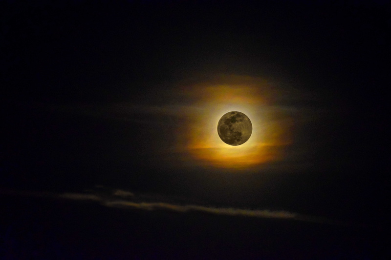 outdoors, full moon, geometric shape, night, eclipse, beauty in nature, moon, natural phenomenon, tranquility, solar eclipse, scenics - nature, cloud - sky