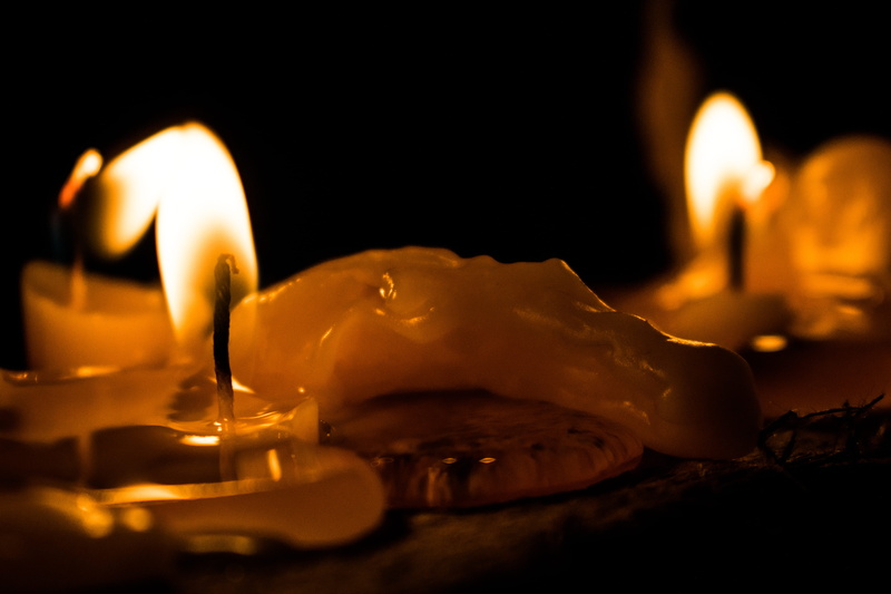 melting, candle, medellín, fire - natural phenomenon, indoors, religion, food and drink, studio shot, black background, no people, flame, food, heat - temperature