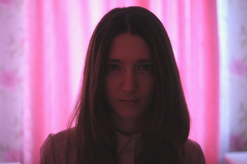 beautiful woman, adult, hairstyle, long hair, brown hair, drama, headshot, soft, violet, pink color, sad, pink, contemplation, drugs, focus on foreground