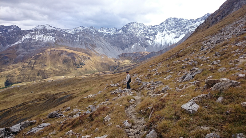 cold temperature, cloud - sky, mountain range, hiking, environment, lifestyles, activity, wandering, one person, scenics - nature, leisure activity, tranquil scene