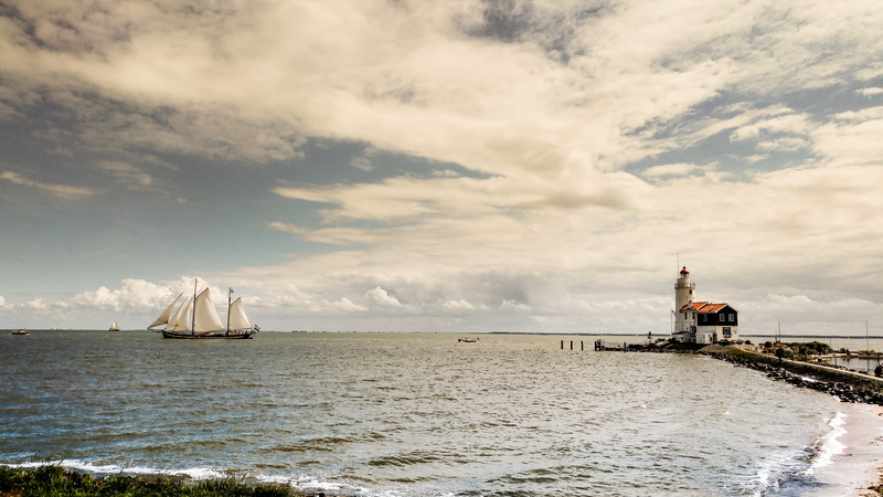 waterfront, scenics - nature, 4K, netherlands, beauty in nature, horizon over water, safety, land, protection, pier, ship, built structure, sky, lighthouse