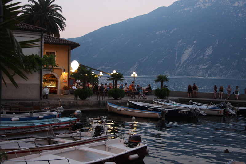 day, 4K, italy, port, bank, mountain, mountain range, tree, promenade, beauty in nature, outdoors, sky, travel, moored, built structure, riva del garda