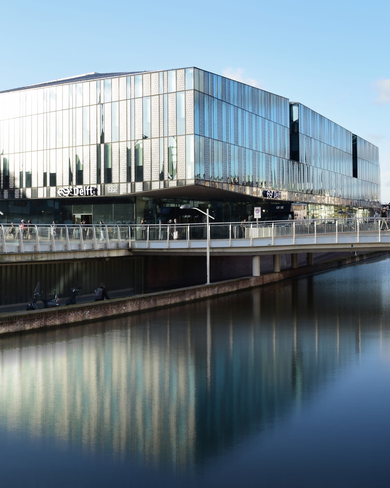 architecture, netherlands government buildings, modern, holland, sky, river, delft, city, glass - material, built structure, waterfront, nature, dutch railways