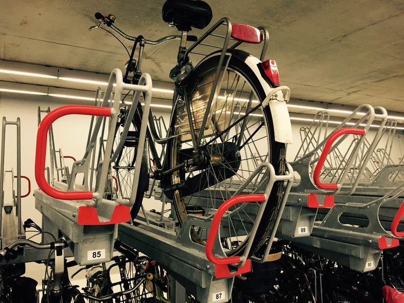 cycling, no people, 2K, wheel, delft, station, rail transportation, stationary, red, land vehicle, day, travel, bicycle, indoors, close-up, industry, metal